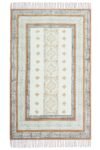 Overhead view of a premium geometric cotton rug featuring terracotta and cream tribal patterns.