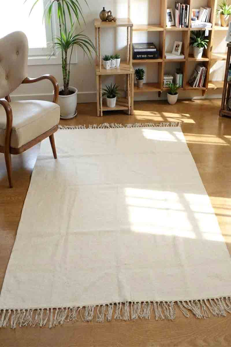 Stunning Solid Ivory Cotton Area Rug - Image 2